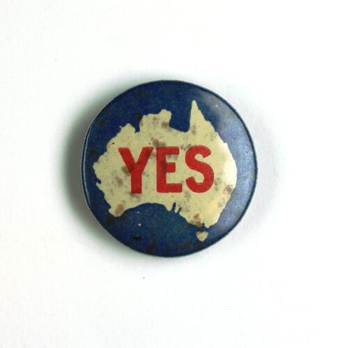 Badge with map of Australia, red text.