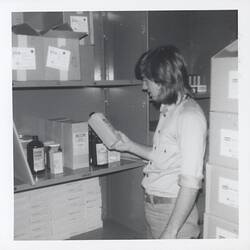 Photograph - Kodak Australasia Pty Ltd, Storeman Holding Chemical Product, Kodak Warehouse, Brisbane, circa 1976