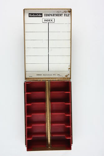 Inside of box with compartments and index label.