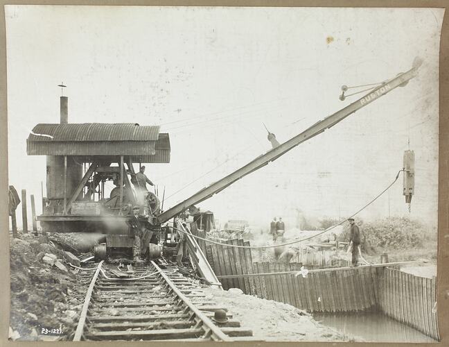 Monochrome photograph of a contruction crane.
