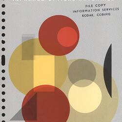 Cover page with illustrated geometric shapes.