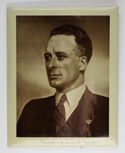 Head and shoulders portrait of man in jacket and tie.