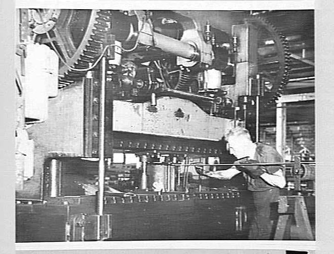 Photograph - H.V McKay Massey Harris, Employee Operating Beam Press, Feb 1948