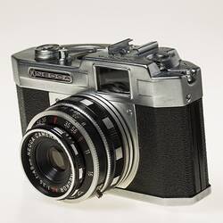 All-metal chrome and black body 35mm camera.