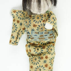 Small Japanese doll in kimono, back side.