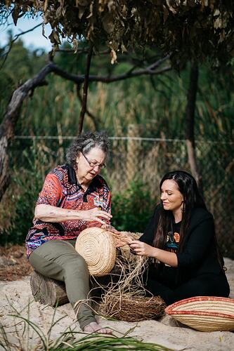 Aunty Jennine Armistead and Taneisha Webster Weave Baskets at Willum Warrain Aboriginal Association