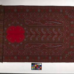 Finely woven red twill tapestry shawl with paisley design in red, orange, black, white and blue.