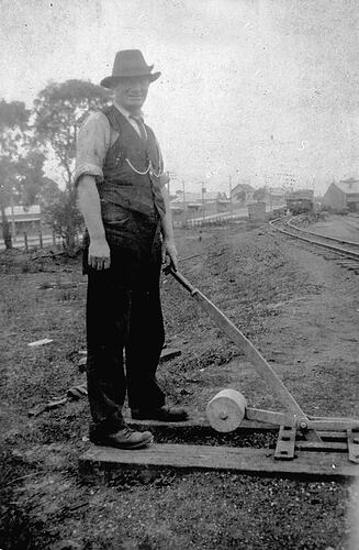 Staff member operating point lever, Moe, circa 1926.