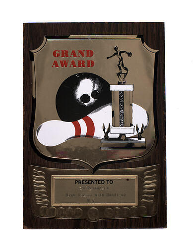 Rectangular wooden plaque bowling trophy.