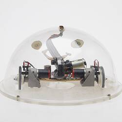 Clear dome containing computer components.