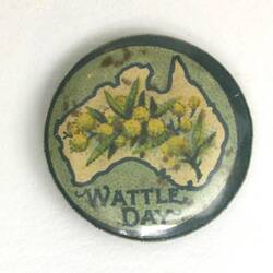 Badge with green background, white outline of Australia with green and yellow wattle and text below.
