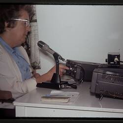 Digital Photograph - Woman using Kenwood Shortwave Radio in Home, Brighton Beach, 1980