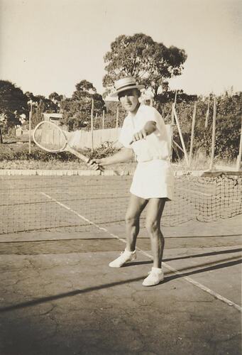 Digital Photograph - Man Swinging Racquet in Tennis Uniform on Tennis Court, circa 1930s