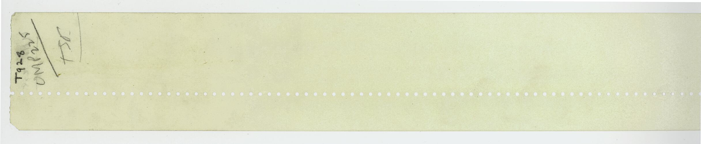 Paper tape: narrow, yellowing, paper with perforation line.