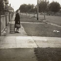 Woman with Shopping Cart & Handbag Looking Back Down Street, Middle Park, 1949