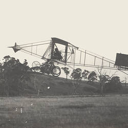 Negative - John Duigan & his Biplane in Flight, Mia Mia, Victoria, circa 1910