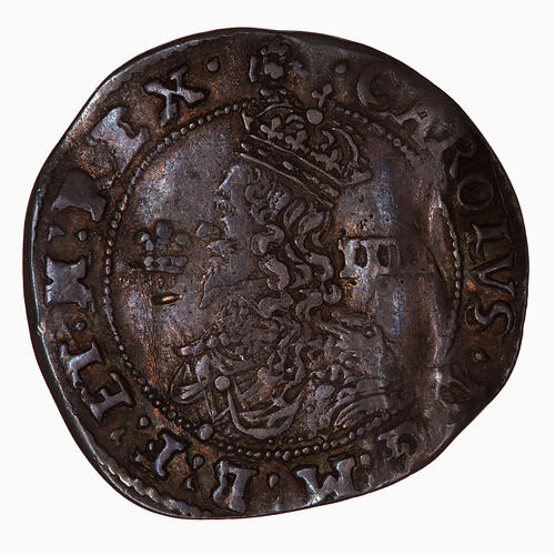 Coin, round, at centre within a circle of beads, crowned bust of the King facing left; text around.