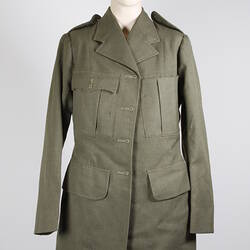 Olive green, long-sleeved army jacket, with epaulettes and four large pockets.