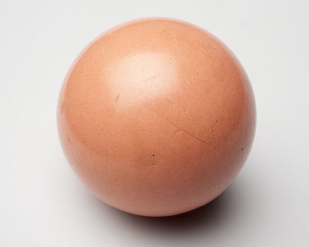 Pale pink billiard ball.