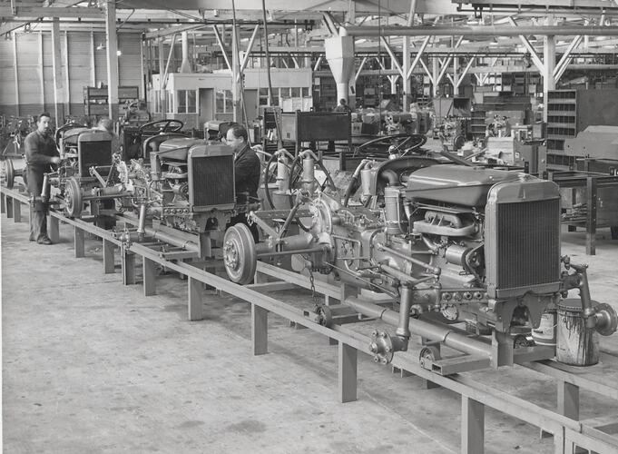 Production line assembly of 3 tractors.
