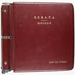 Red book cover with printed gold text.