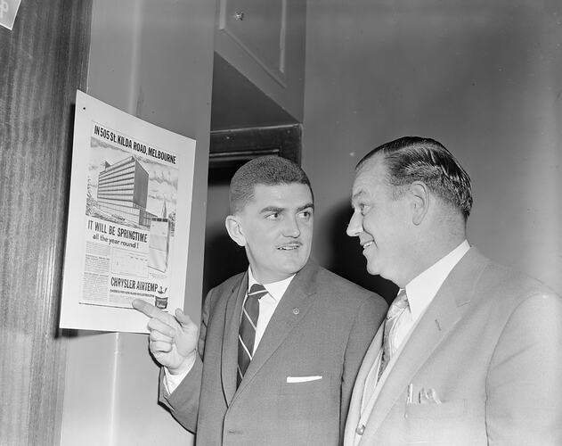 Noyes Bros, Two Men Looking at Advertising, Melbourne, 17 Jul 1959