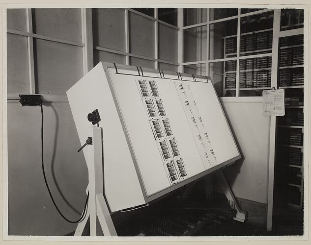Large lightbox on a stand with photographic plates.