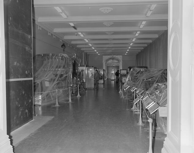 Covered transport displays during stairway construction in Verdon Hall, Science Museum of Victoria, Melbourne, 1970s