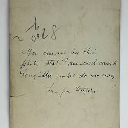 Back of photograph showing hand-written inscription.