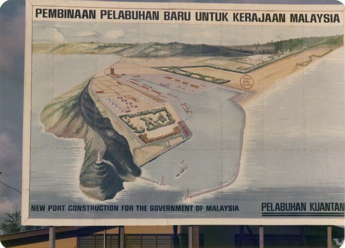 Sign featuring illustration of harbour.