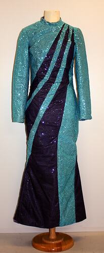 Light blue full length sequin dress with dark blue swirls from shoulder to hip.
