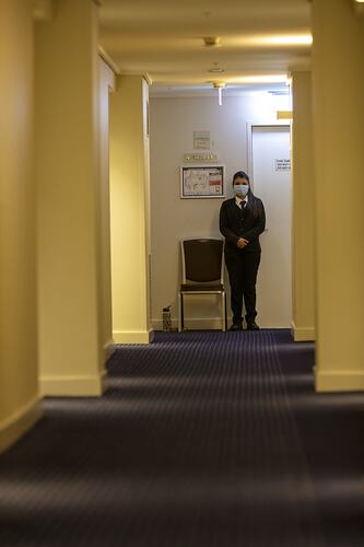 Staff Member at end of Hotel Corridor, Novotel, Melbourne, 13 May 2020