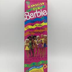 Back of Barbie box. Pink with colourful stripes and images of Barbie dolls.