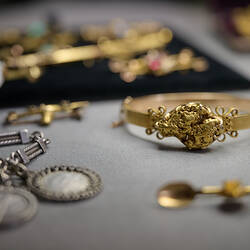 Selection of items from the state of victoria gold jewellery collection.