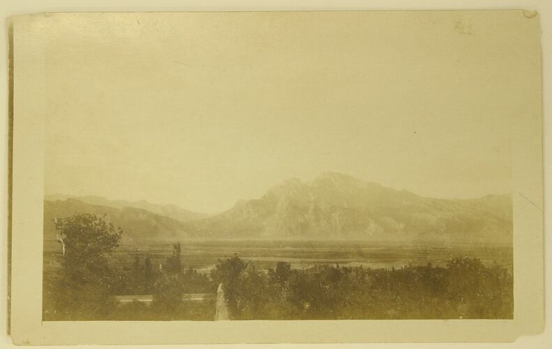 landscape with mountains in background.