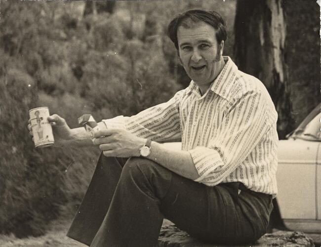 Digital Photograph - Man Sitting on Tree Stump with Beer & Cigarettes, Warrandyte, 1973