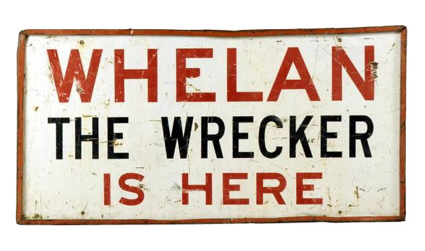 Sign - 'Whelan the Wrecker is Here'