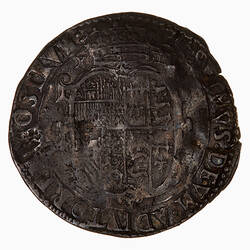 Coin, round, Crowned and garnished oval shield bearing the arms of Spain, England and France.