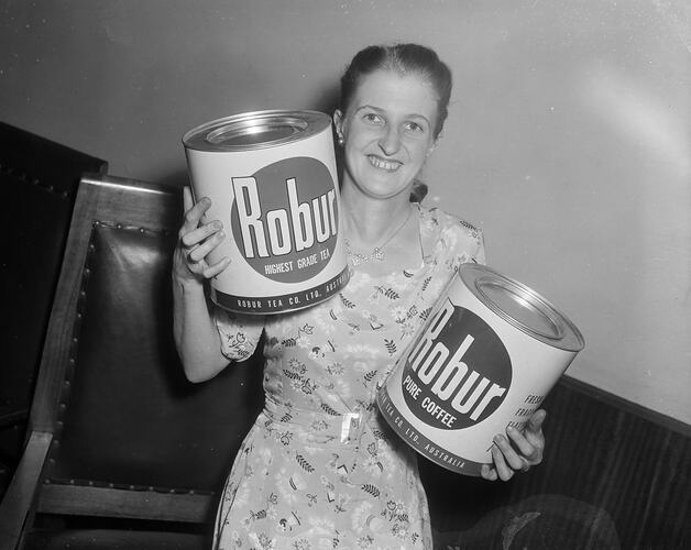 Negative - Woman with Robur Tea & Coffee Tins, Melbourne, Victoria, circa 1956