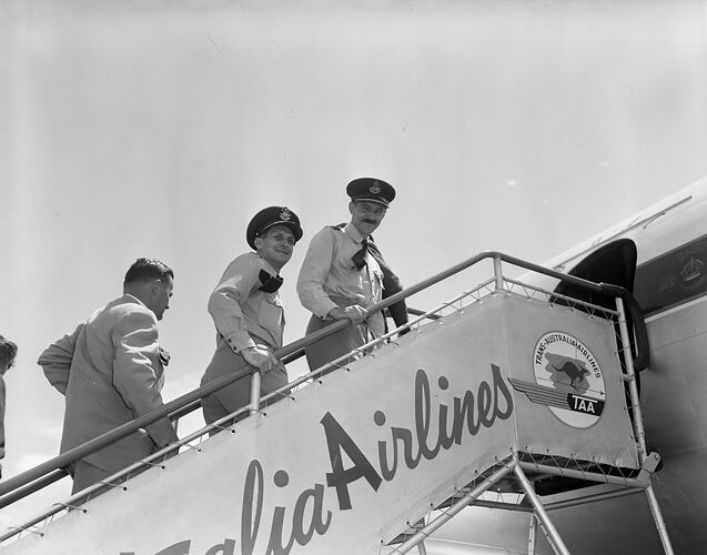 Trans Australia Airlines, Group of Men Entering Aeroplane, Essendon Airport, Victoria, Dec 1955