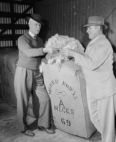 Two Men with Wool Bale, Swan HIll, Victoria, 18 Aug 1959