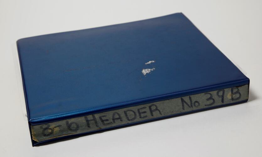 Photograph Album of harvesting equipment.