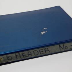 Photograph Album of harvesting equipment.