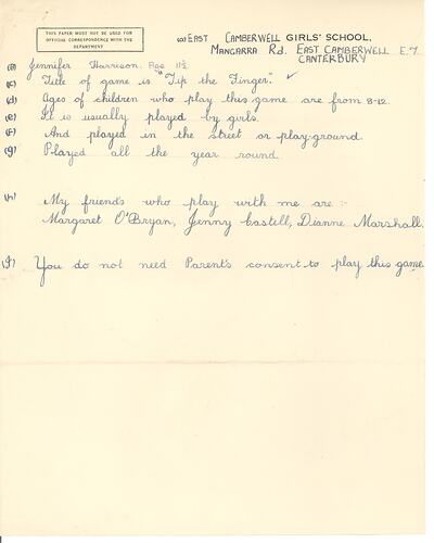 Handwritten game description in black ink on paper
