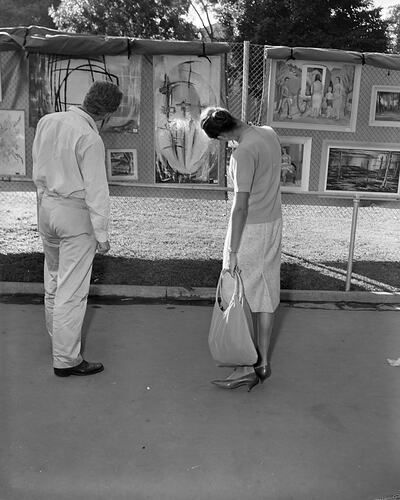 Pair Looking at Artwork, Moomba Festival, Melbourne, 08 Mar 1960