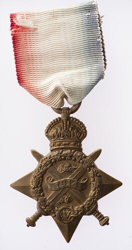 Front of bronze four point star medal 'ensigned' by a crown. Red, white and blue ribbon.