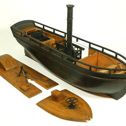 Wooden paddle steamer model, with deck removed.