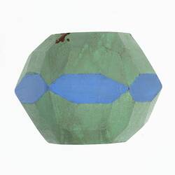 Wooden crystal model painted green and blue.