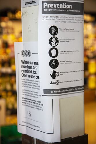 White information sign with printed text.