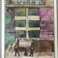 Brown/purple hotel. People stand in its large windows. Protest signs and police in foreground.